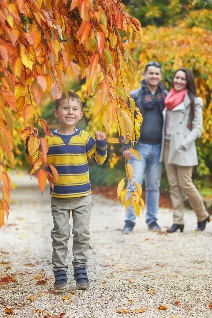 Mother, father, and son enjoying fall foliage at Bebeah Garden, Mount Wilson.