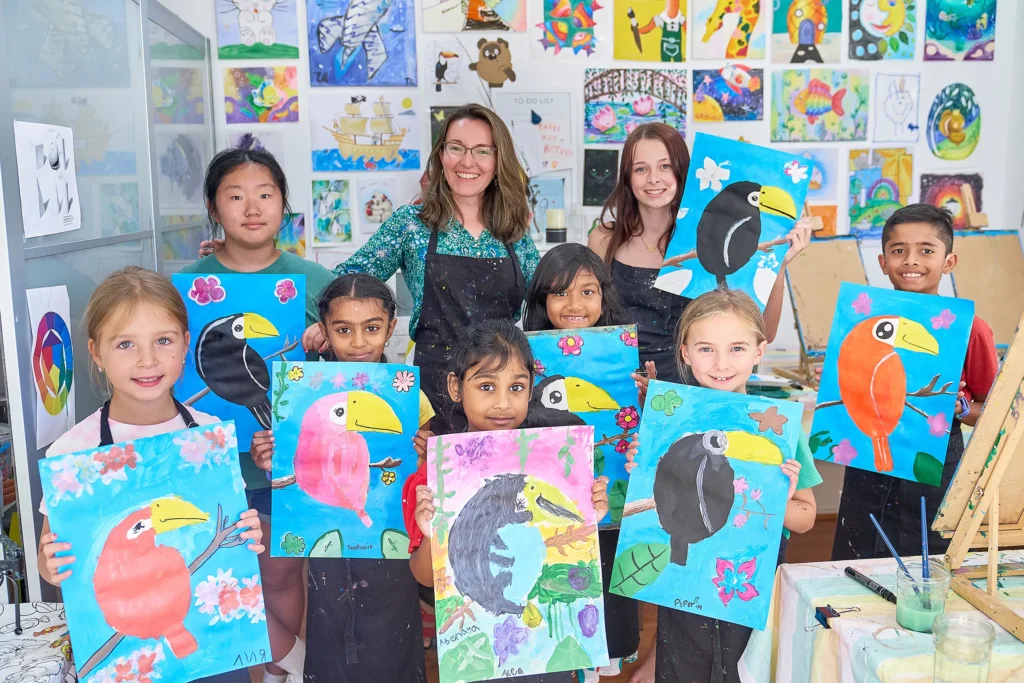 Art studio owner teaching a painting class during personal branding session at Glenwood Art Studio in Kellyville