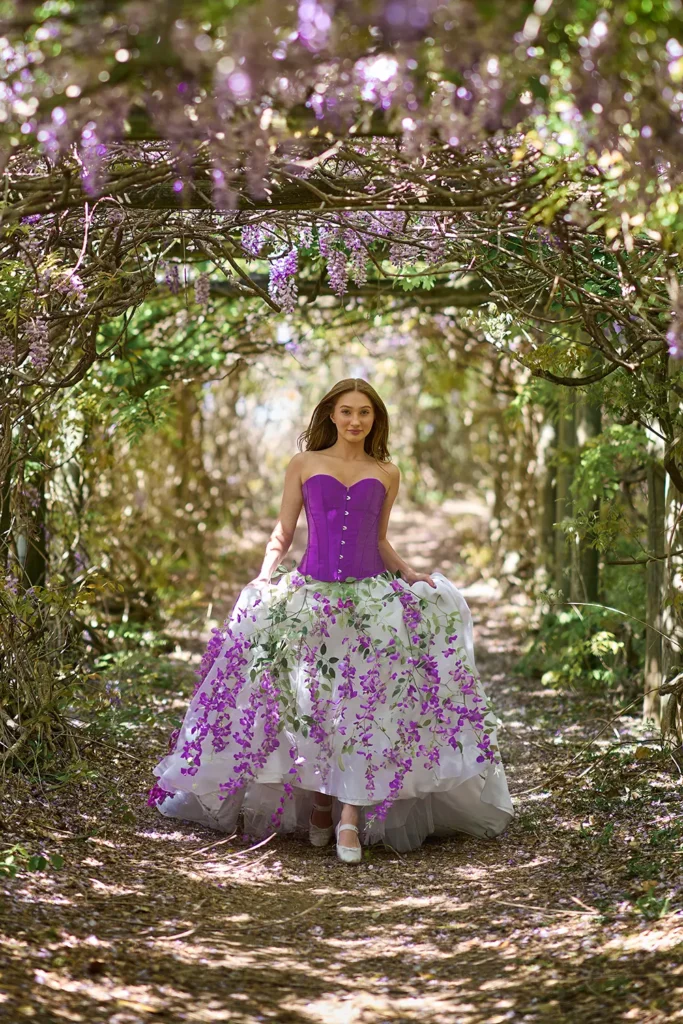 Whimsical woman running through wisteria arch tunnel at Muston Park in Chatswood, fairy tale Dreamcrafted portrait