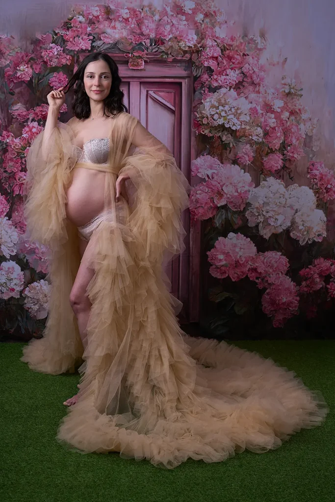 Pregnant woman in flowing pink gown at Mount Colah home studio
