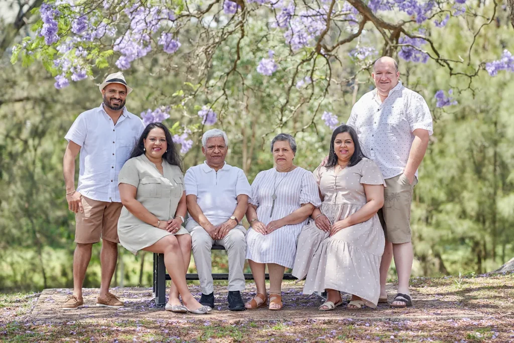 Family group beneath flowering tree at Parramatta Park
