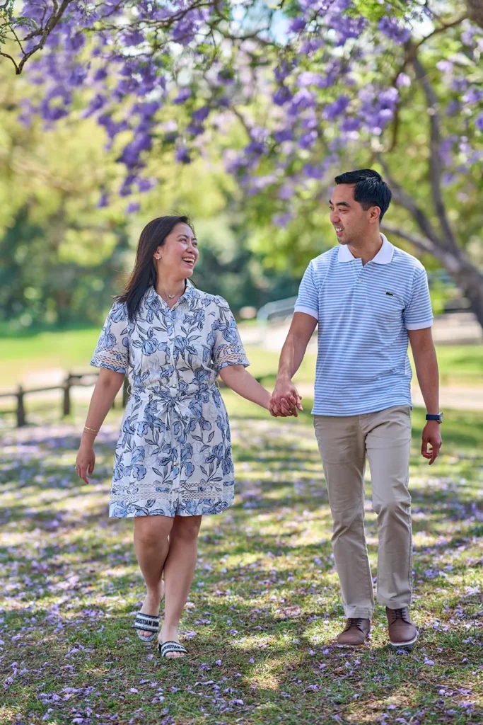 Mother and father walking hand in hand