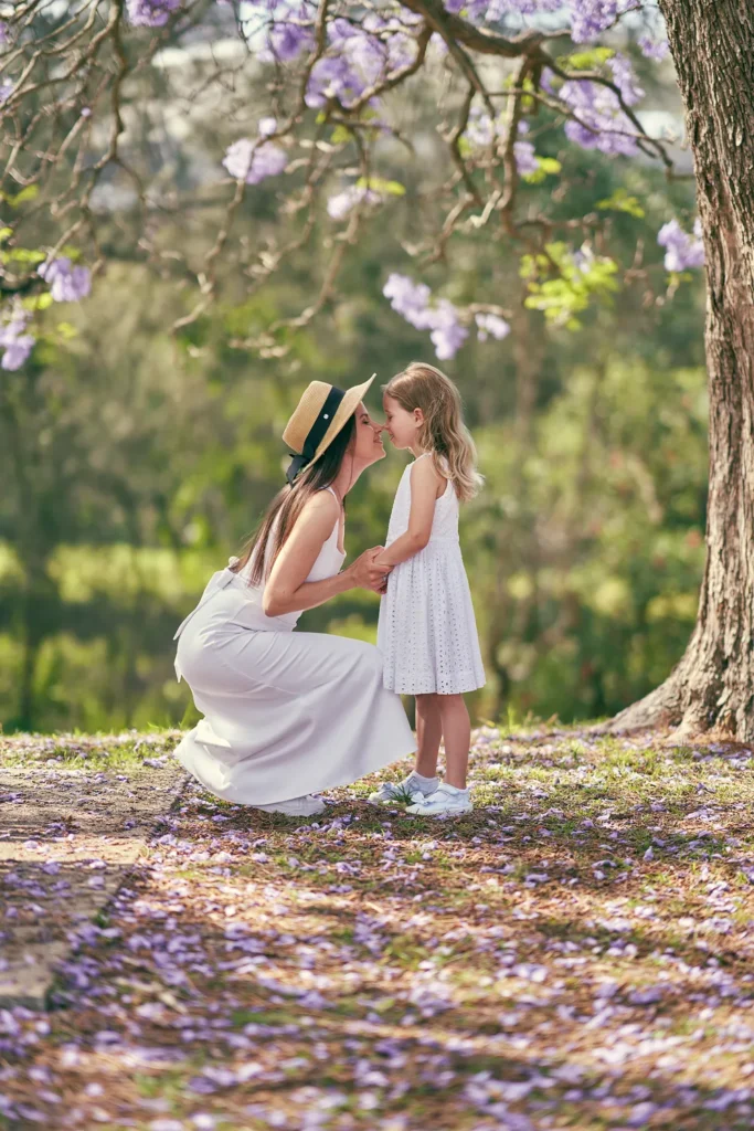 Mother hugging daughter at Parramatta Park