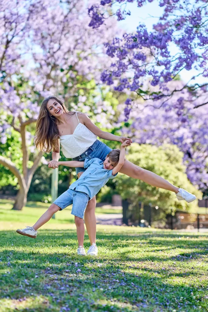 Mother and son under jacaranda in Hornsby