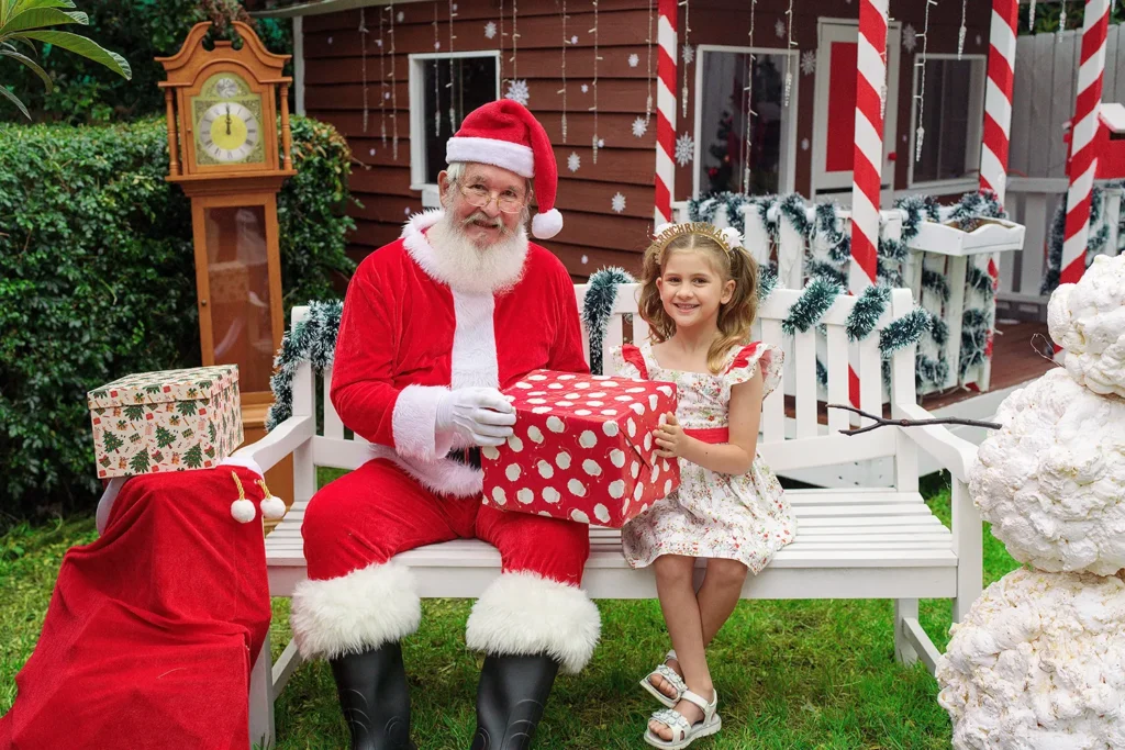 Girl receives gift from Santa