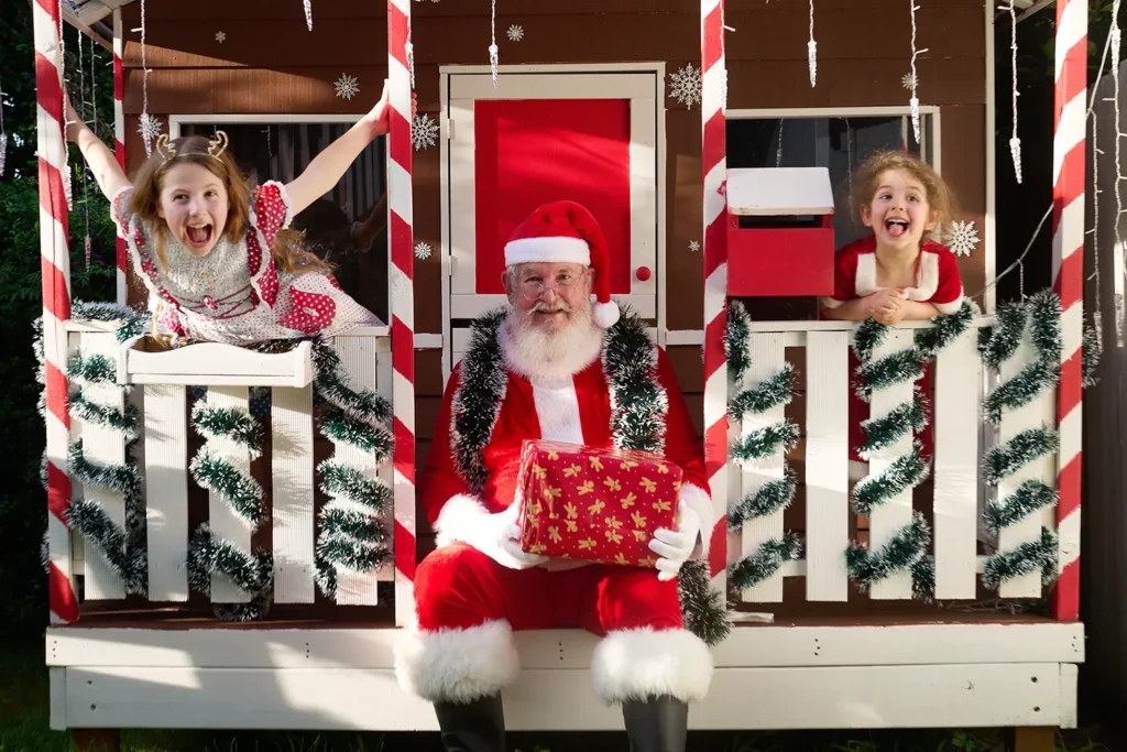Girls wave with Santa, Mount Colah Hornsby