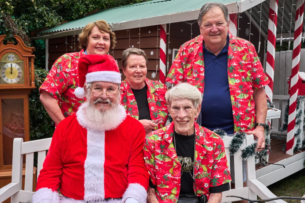 Extanded sit with Santa smiling